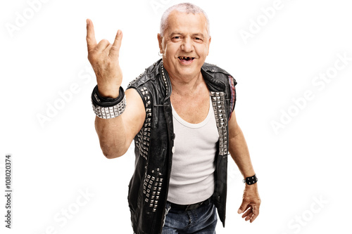 Senior punker making a hardcore gesture
