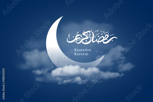Ramadan Kareem greeting with crescent moon and hand drawn calligraphy lettering which means ''Ramadan kareem'' on night cloudy background. Editable Vector illustration.