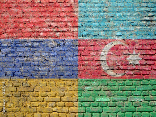 armenian and Azerbaijani flags painted on a wall