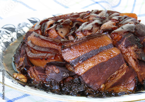 Braised Pork belly soaked in soya sauce, with preserved vegetable - famous Chinese dish "mei-gan-cai-kou-rou"