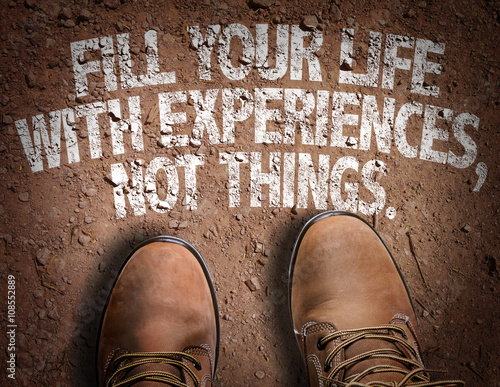 Top View of Boot on the trail with the text: Fill Your Life With Experiences, Not Things