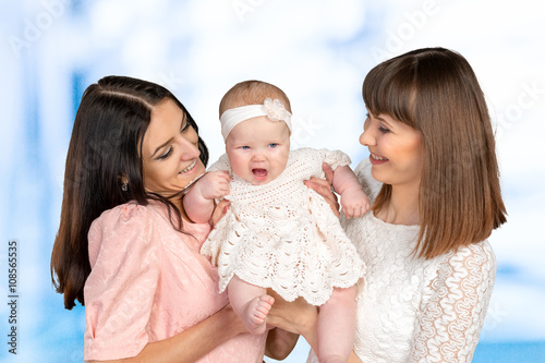 mother with daughter and aunt godmother