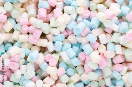 Background or texture of colorful mini marshmallows.