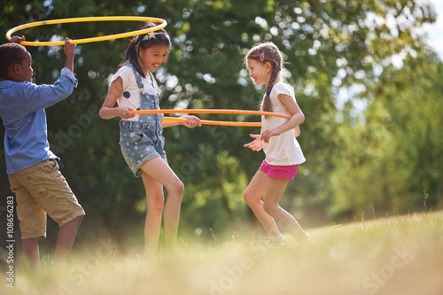 Group of kids with hula hoop