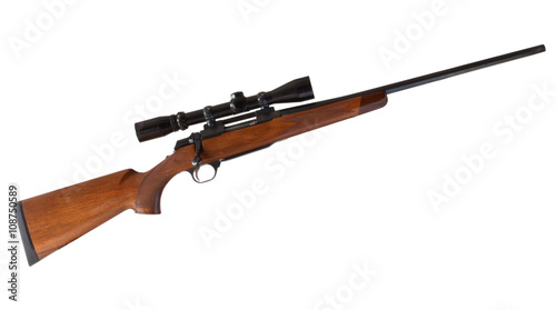 Bolt action rifle with a wood stock and high-powered riflescope isolated on a white background.