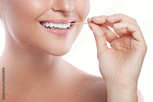 Female teeth and toothpick