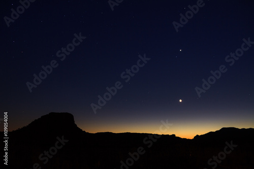 Beautiful landscape after sunset with the moon, Jupiter and Venus, seen from Isalo, Madagascar