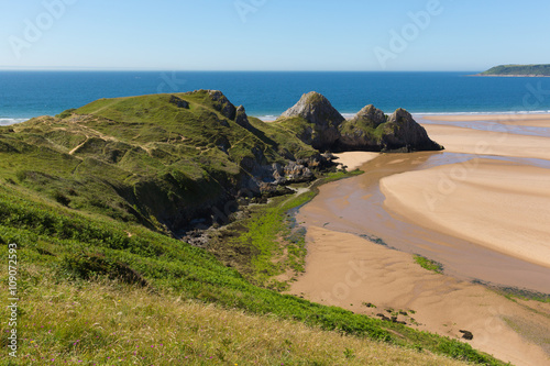 Three Cliffs Bay the Gower Wales uk in summer sunshine beautiful part of the peninsula 