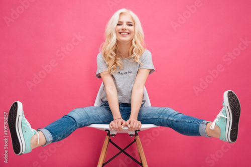 Charming woman sitting on the chair