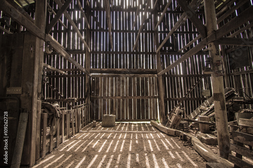 Morning Light. Morning sunlight illuminates the interior of a barn. This is a barn open to the public on public park lands, it is not a privately owned property.