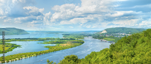 Amazing panoramic view from the height on the touristic part of the Volga river near Samara city at summer sunny day.Beautiful natural landscape.Picturesque central part of Russia.Europe.