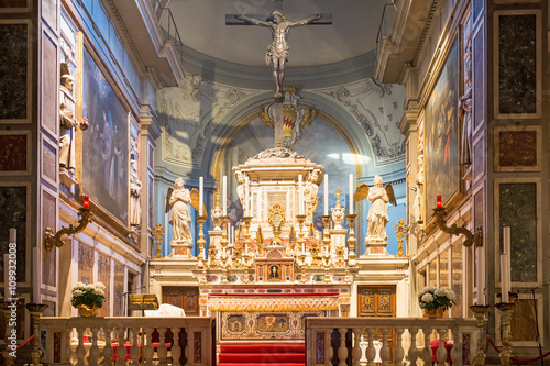 Altar with crucifix in Chiesa di Ognissanti church in Florence, Italy