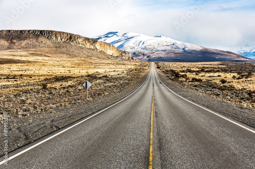 Empty road in El Calafate with a snow mountain, Patagonia Argentina