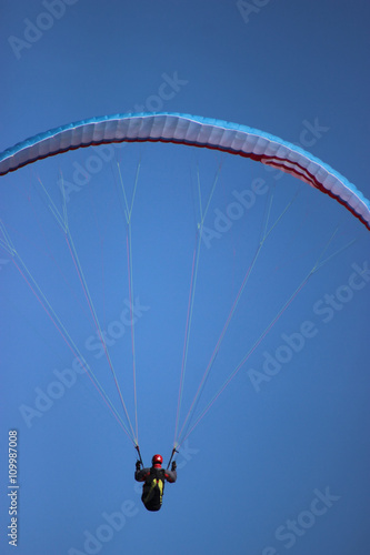 Paraglider on Blue Sky