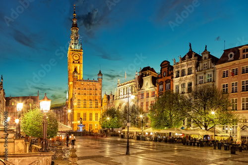 Street scene with renaissance building of the former Town Hall in Gdansk, Poland.