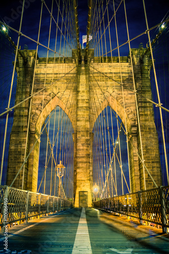 Beautiful Brooklyn Bridge in New York City lit up at night