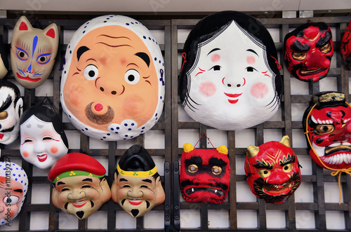 japanese traditional paper masks "Omen" such as Hyottoko (clownish mask) and Okame (plain-looking woman) 