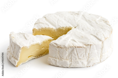 White mould cheese with cut slice isolated on white.