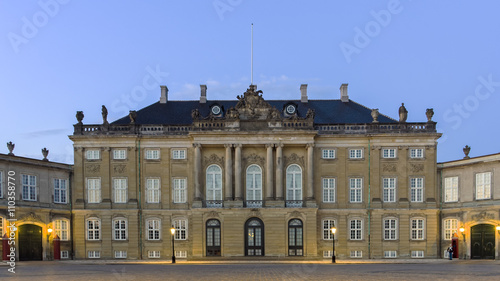 One of the four identical classical palace façades on Amalienborg Square from 1760 in Copenhagen, Denmark