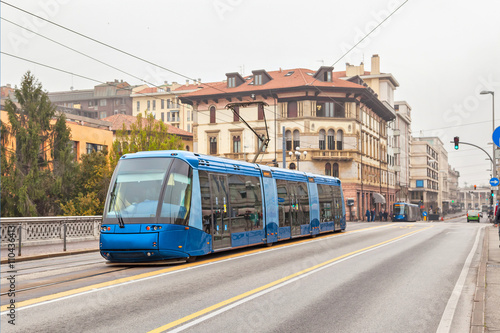 Blue tram on the street of Padua