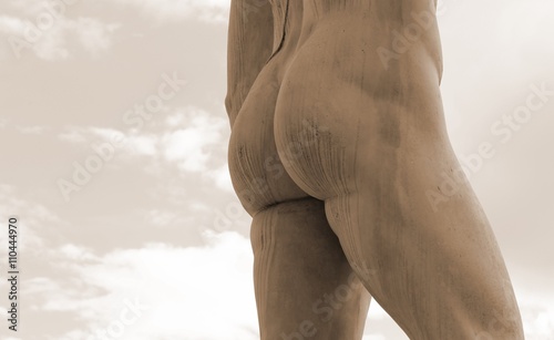 marble statue with muscular legs and buttocks white