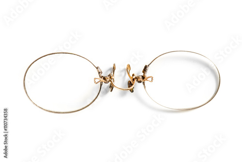 Late 19th century antique pince nez eyeglasses, isolated on white