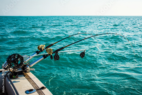 Two Fishing Poles Mounted on a Boat