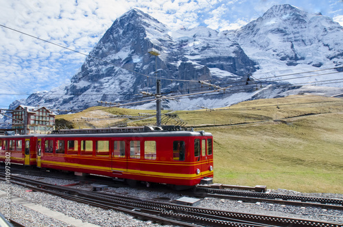 Red Train with Jungfrau Mountain, Switzerland