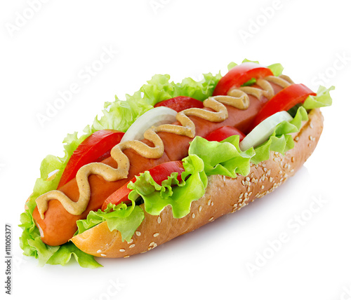 American style hot dog with lettuce, onion and tomato close-up on white background. Fast food.