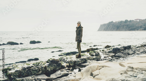 Woman standing on shore