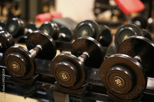Sport equipment in fitness room or gym room, relax room for healthy people, Dumbbell in fitness and gym room.