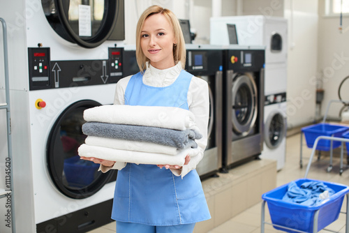 Portrait of a woman Laundry worker at the dry cleaners