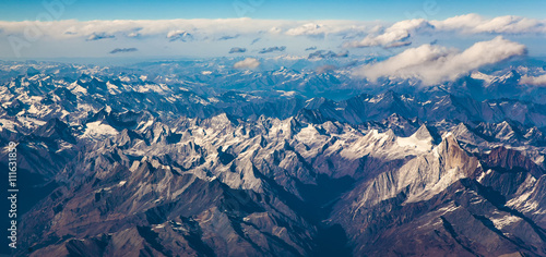  view from the aircraft to the mountains of the Himalaya