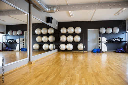 Pilate Balls Arranged In Shelves By Mirror