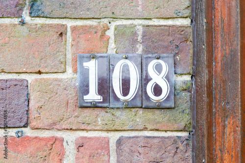 House Number 108 sign