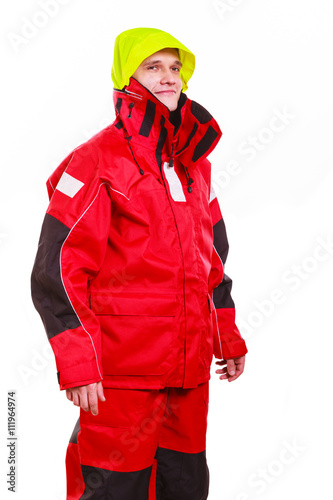 Hooded man in waterproof jacket