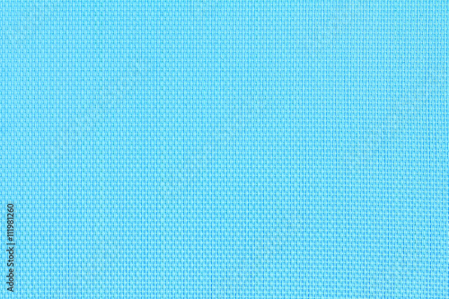 Abstract background texture of blue fishnet cloth material. Blue nylon texture for background and design with copy space for text or image.
