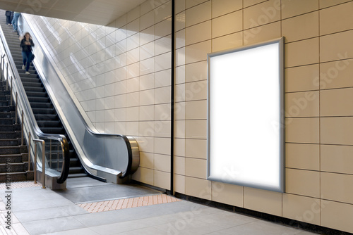 Vertical light box poster mockup in metro station, high resolution.