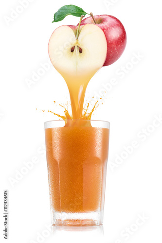 Pure apple juice pouring out from fruit