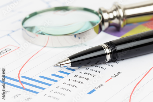 Pareto principle business analysis planning with pen and magnifi