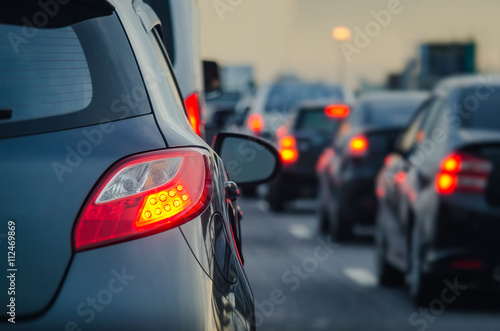 traffic jam with row of cars on expressway during rush hour