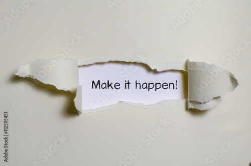 The word make it happen appearing behind torn paper.