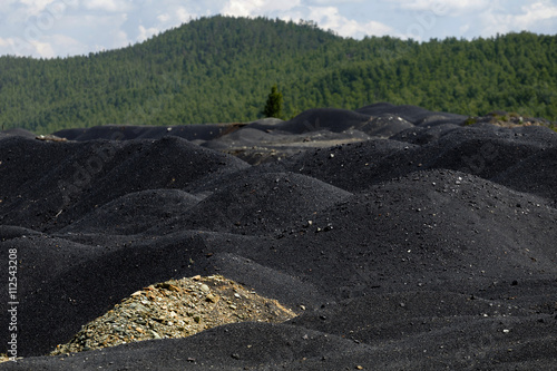 The accumulation of slag after the establishment of the plant.