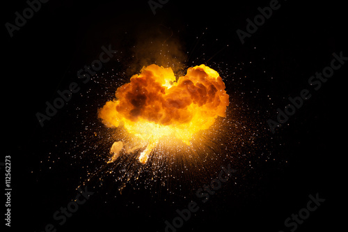 Realistic fiery explosion over a black background