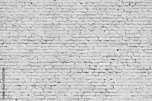 Old grunge brick white wall background