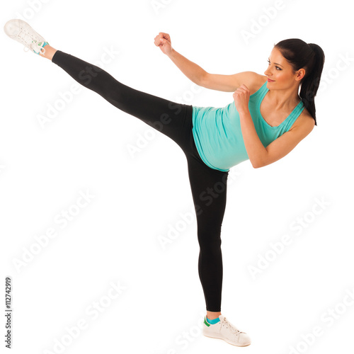 Karate woman kicks in copy space