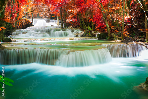 Waterfall in beautiful autumn forest 