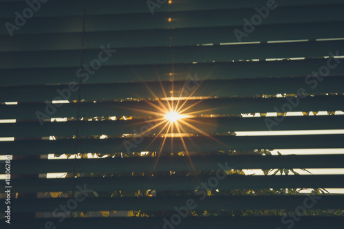 Sunlight through the blinds