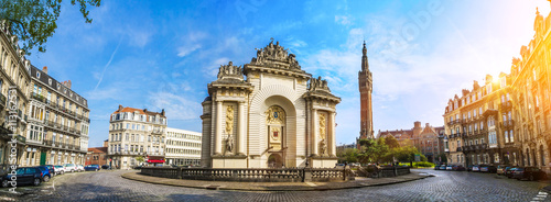 View of french city Lille with belfry, council hall and Paris’ gate