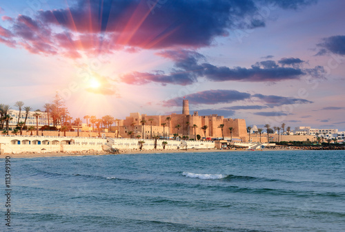 Beautiful view of the ancient Ribat fortress at sunset. Tunisia, Monastir. Mediterranean Sea.